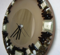 Laikrodis ant veidrodzio Kava